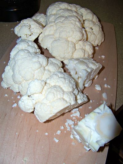 Throw core out (bottom right corner) and cut or break cauliflower into medium-size florets.